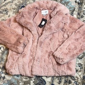 Fashionnova curve fluffy jacket.